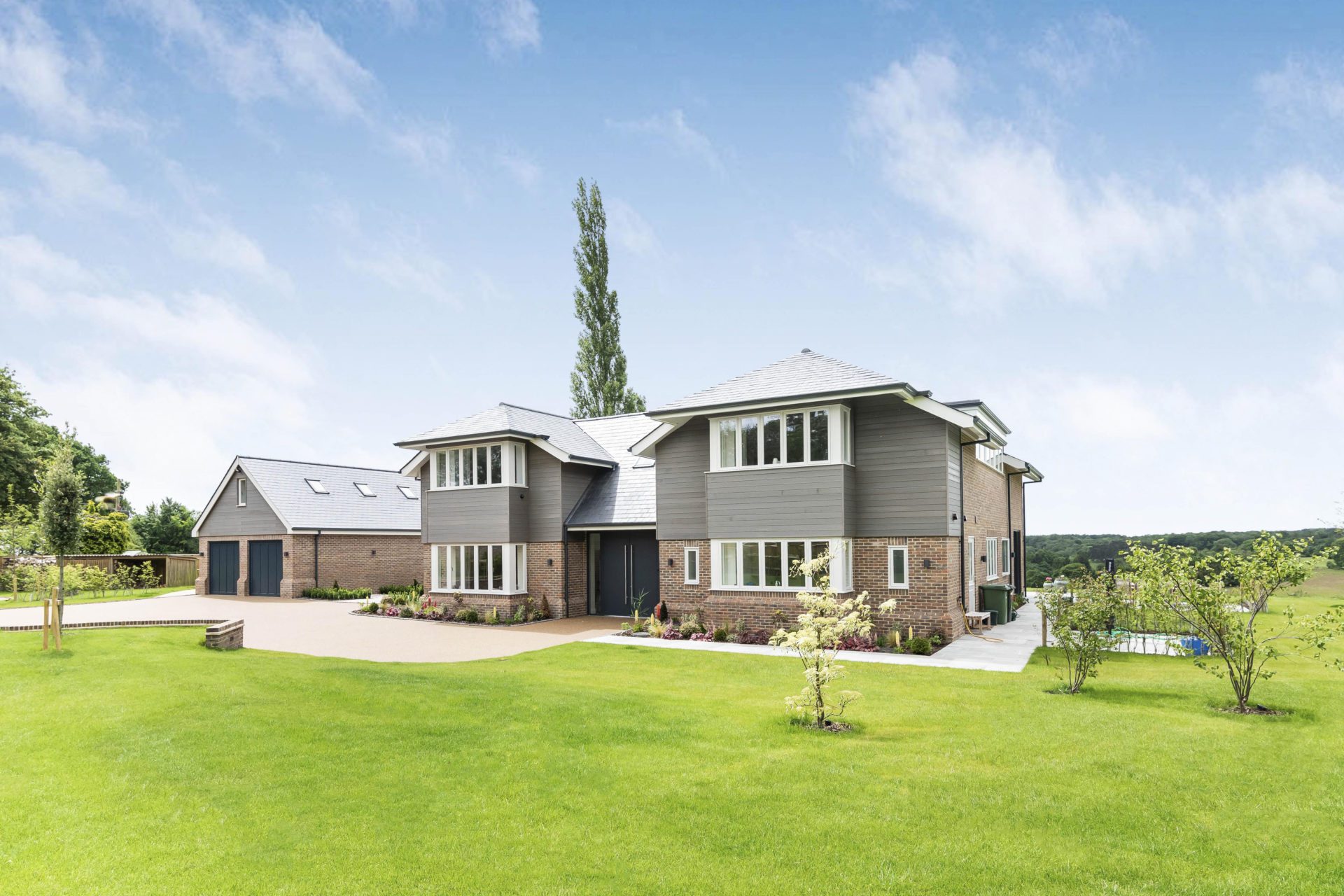 New build property, front view and gardens image