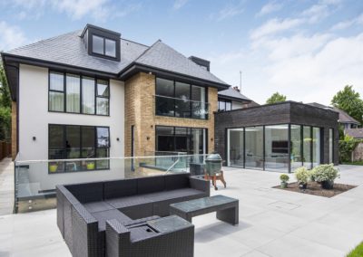 Six bedroom bespoke build Buckinghamshire - Rear of property and patio area image