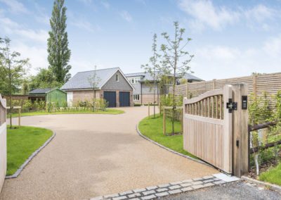 Four bedroom detached new build property in South Oxfordshire - View of the house from the front gates image